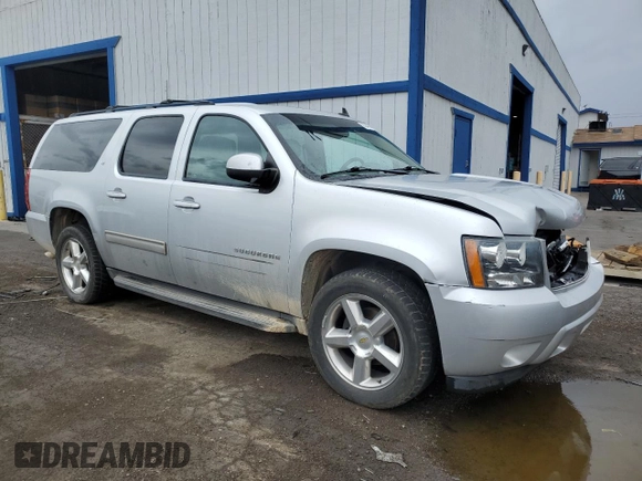 2013 Chevrolet Suburban LT with VIN 1GNSCJE07DR305437, listed as a Copart auction lot 55346605 with 160,518 mi miles and Salvage title. Bid and sale history available at DreamBid. Image 4.