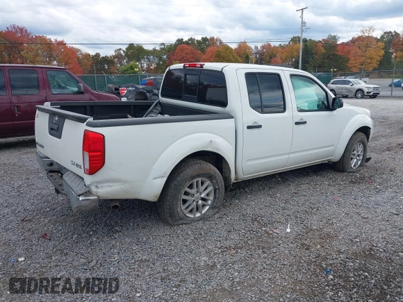 2014 Nissan Frontier SV with VIN 1N6AD0EV2EN718895, listed as a IAAI auction lot 40332972 with 53,391 mi miles and . Bid and sale history available at DreamBid. Image 4.