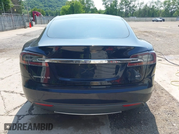 2014 Tesla Model S 60 with VIN 5YJSA1H17EFP65983, listed as a IAAI auction lot 42399288 with 166,365 mi miles and . Bid and sale history available at DreamBid. Image 17.