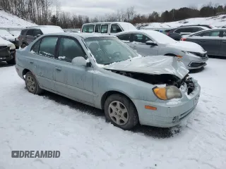 2005 Hyundai Accent GLS with VIN KMHCG45C05U605523, listed as a Copart auction lot 43811815 with 190,638 mi miles and Salvage Title. Bid and sale history available at carsss.com. Image 4.