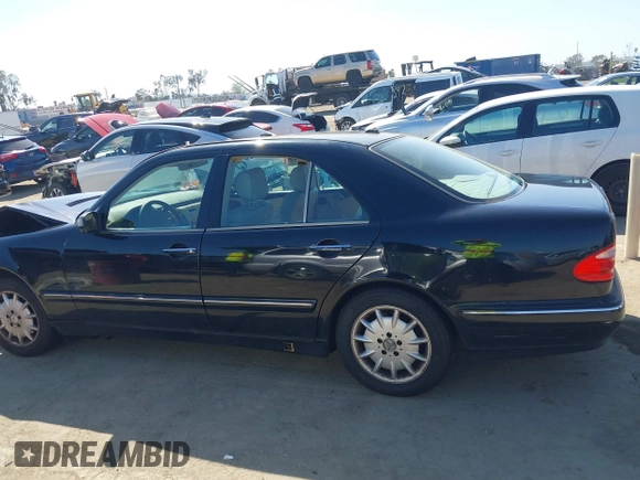 2001 Mercedes-Benz E-Class with VIN WDBJF65J11B368277, listed as a IAAI auction lot 41855716 with 207,864 mi miles. Bid and sale history available at carsss.com. Image 14.