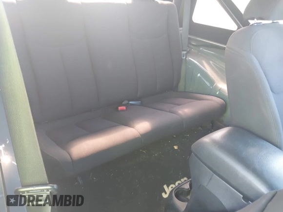 2015 Jeep Wrangler Freedom Edition with VIN 1C4AJWAG1FL714002, listed as a IAAI auction lot 42579024 with 98,732 mi miles and . Bid and sale history available at DreamBid. Image 8.