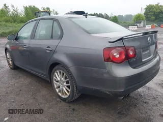 2008 Volkswagen Jetta Wolfsburg Edition with VIN 3VWRJ71K98M152510, listed as a IAAI auction lot 42410298 with 112,727 mi miles and . Bid and sale history available at DreamBid. Image 3.
