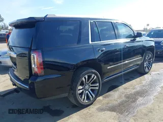 2019 GMC Yukon Denali with VIN 1GKS2CKJ4KR191886, listed as a IAAI auction lot 41198227 with 74,325 mi miles. Bid and sale history available at carsss.com. Image 4.