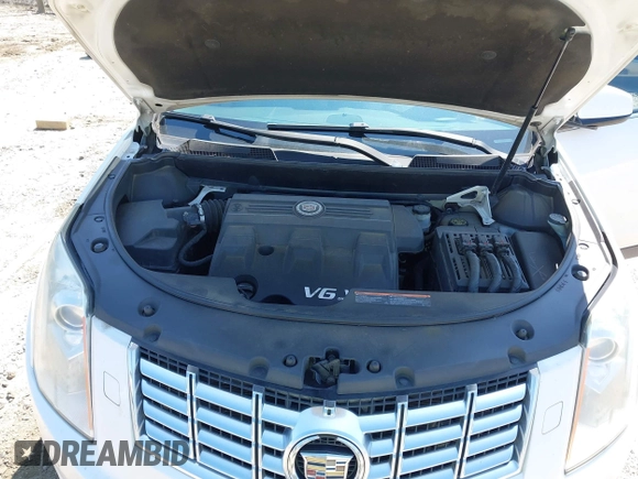 2013 Cadillac SRX Performance Collection with VIN 3GYFNDE34DS530275, listed as a IAAI auction lot 42148040 with 244,929 mi miles. Bid and sale history available at carsss.com. Image 10.