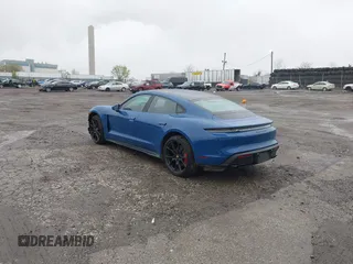 2022 Porsche Taycan GTS z VIN WP0AD2Y17NSA59692, wystawiony jako IAAI lot #41961572 z przebiegiem 12 680 mil mil oraz . Historia ofert i sprzedaży dostępna na DreamBid. Obrazek 3.