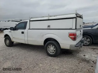 2014 Ford F-150 XL with VIN 1FTNF1CT3EKE02302, listed as a Copart auction lot 69056354 with 203,763 mi miles and Salvage Title. Bid and sale history available at carsss.com. Image 2.