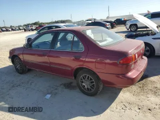 1996 Nissan Sentra XE z VIN 3N1AB41D3TL027288, wystawiony jako Copart lot #77255804 z przebiegiem 132 033 mil mil oraz Czysty tytuł • Clean title. Historia ofert i sprzedaży dostępna na DreamBid. Obrazek 2.