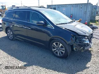 2017 Honda Odyssey Touring with VIN 5FNRL5H97HB006745, listed as a IAAI auction lot 42184876 with 91,996 mi miles and . Bid and sale history available at DreamBid. Image 1.