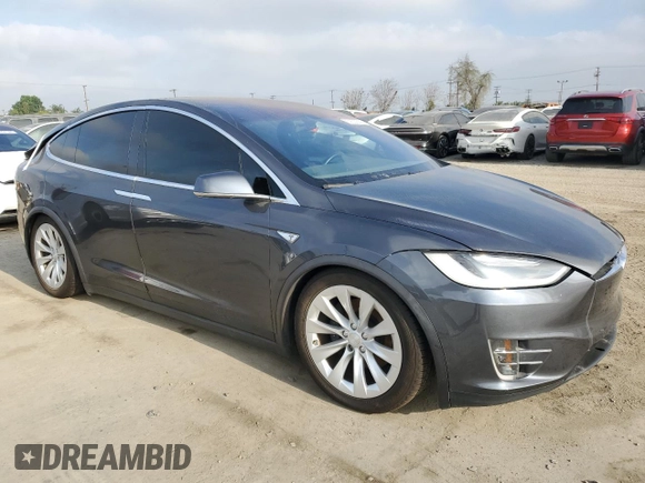 2016 Tesla Model X 70D with VIN 5YJXCAE2XGF001562, listed as a Copart auction lot 53539225 with 73,274 mi miles and Salvage Title. Bid and sale history available at DreamBid. Image 4.