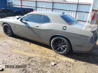 2017 Dodge Challenger R/T with VIN 2C3CDZBT5HH514631, listed as a IAAI auction lot 42379274 with 90,894 mi miles and . Bid and sale history available at DreamBid. Image 3.