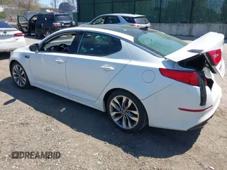 2014 Kia Optima SXL Turbo with VIN 5XXGR4A62EG283618, listed as a IAAI auction lot 42143349 with 82,070 mi miles and . Bid and sale history available at DreamBid. Image 3.