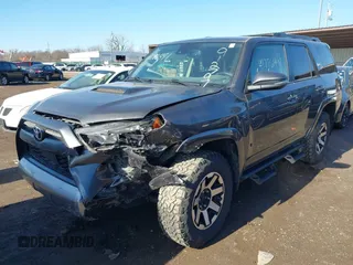 2021 Toyota 4Runner TRD Off Road Premium with VIN JTERU5JR0M5912797, listed as a IAAI auction lot 41796491 with 106,602 mi miles and . Bid and sale history available at DreamBid. Image 2.