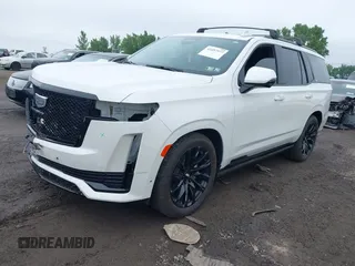 2024 Cadillac Escalade 4WD Sport Platinum with VIN 1GYS4GKL2RR140583, listed as a IAAI auction lot 42497577 with 9,887 mi miles and . Bid and sale history available at DreamBid. Image 2.