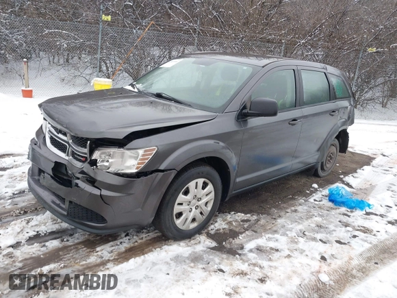 2014 Dodge Journey SE with VIN 3C4PDCAB0ET182376, listed as a IAAI auction lot 41569006 with 106,024 mi miles and . Bid and sale history available at DreamBid. Image 2.