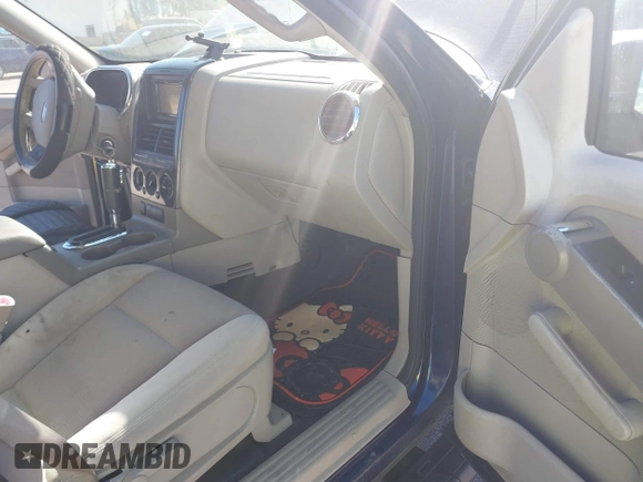 2007 Ford Explorer Sport Trac XLT z VIN 1FMEU31K57UA25387, wystawiony jako IAAI lot #41839716 z przebiegiem 199 004 mil mil oraz . Historia ofert i sprzedaży dostępna na DreamBid. Obrazek 5.
