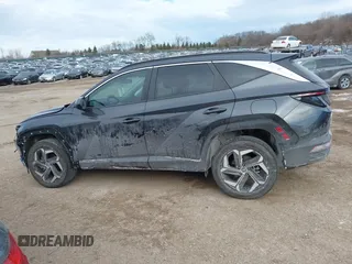 2023 Hyundai Tucson SEL z VIN 5NMJFCAE4PH290915, wystawiony jako IAAI lot #41426737 z przebiegiem 13 113 mil mil oraz . Historia ofert i sprzedaży dostępna na DreamBid. Obrazek 14.