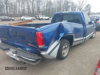 1997 GMC New Sierra 1500 SLE with VIN 1GTEC14W6VZ503469, listed as a IAAI auction lot 41798168 with 232,567 mi miles. Bid and sale history available at carsss.com. Image 4.