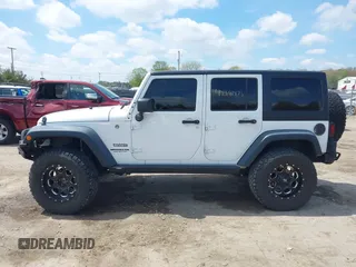 2016 Jeep Wrangler Unlimited Sport z VIN 1C4HJWDG5GL308803, wystawiony jako IAAI lot #42181473 z przebiegiem 41 621 mil mil oraz . Historia ofert i sprzedaży dostępna na DreamBid. Obrazek 15.