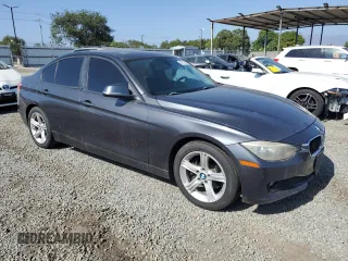 2013 BMW 3 Series 320i with VIN WBA3B1C58DK128983, listed as a Copart auction lot 61919185 with 155,698 mi miles and Clean title. Bid and sale history available at DreamBid. Image 4.