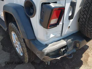 2018 Jeep Wrangler Unlimited Sport with VIN 1C4HJXDG4JW319142, listed as a IAAI auction lot 42702550 with 72,023 mi miles and . Bid and sale history available at DreamBid. Image 6.