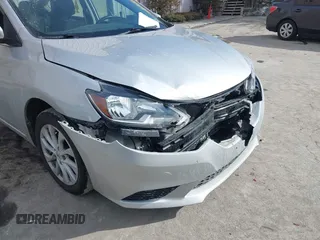 2019 Nissan Sentra S with VIN 3N1AB7AP0KY356477, listed as a IAAI auction lot 41595916 with 58,866 mi miles and . Bid and sale history available at DreamBid. Image 6.