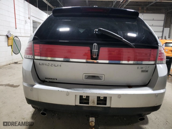 2010 Lincoln MKX with VIN 2LMDJ8JC5ABJ34430, listed as a Copart auction lot 80298594 with 215,543 mi miles and Clean Title. Bid and sale history available at carsss.com. Image 6.