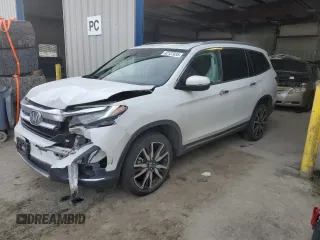 2020 Honda Pilot Elite with VIN 5FNYF6H00LB058804, listed as a Copart auction lot 42127035 with 107,664 mi miles and Salvage title. Bid and sale history available at DreamBid. Image 1.