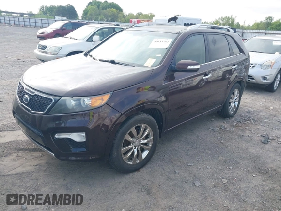 2011 Kia Sorento SX with VIN 5XYKW4A28BG127753, listed as a IAAI auction lot 42033754 with 163,470 mi miles. Bid and sale history available at carsss.com. Image 2.
