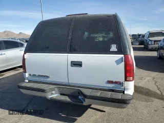 1999 GMC Suburban with VIN 3GKEC16R6XG538009, listed as a Copart auction lot 87112424 with 220,487 mi miles and Clean Title. Bid and sale history available at DreamBid. Image 6.