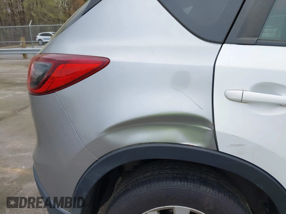 2013 Mazda CX-5 Touring with VIN JM3KE2CE0D0105115, listed as a IAAI auction lot 41899956 with 301,264 mi miles. Bid and sale history available at carsss.com. Image 6.