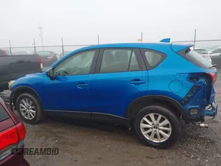 2013 Mazda CX-5 Sport with VIN JM3KE4BE9D0157890, listed as a IAAI auction lot 40998406 with 134,087 mi miles. Bid and sale history available at carsss.com. Image 14.