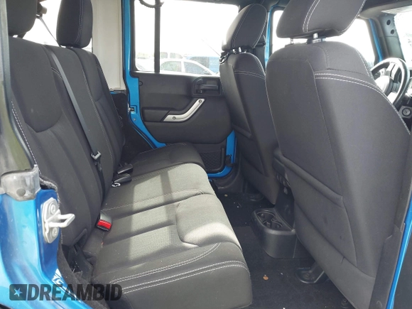 2015 Jeep Wrangler Unlimited Rubicon with VIN 1C4BJWFG5FL558348, listed as a IAAI auction lot 41460025 with 106,012 mi miles. Bid and sale history available at carsss.com. Image 8.