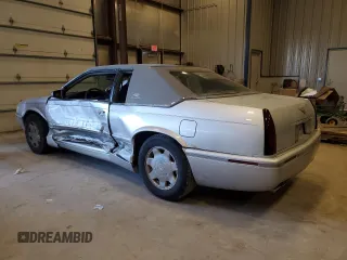 2000 Cadillac Eldorado Touring ETC z VIN 1G6ET1294YU180525, wystawiony jako Copart lot #89253455 z przebiegiem 102 230 mil mil oraz Nie do naprawy • Non repairable. Historia ofert i sprzedaży dostępna na DreamBid. Obrazek 2.