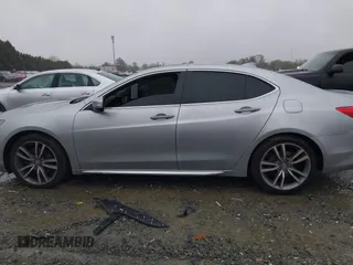 2019 Acura TLX Technology with VIN 19UUB2F42KA007788, listed as a IAAI auction lot 41970877 with 104,356 mi miles and . Bid and sale history available at DreamBid. Image 14.
