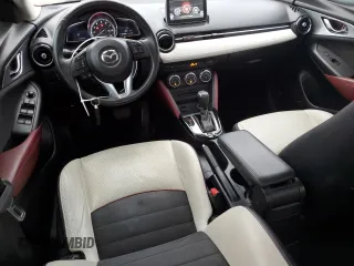 2016 Mazda CX-3 Grand Touring with VIN JM1DKBD76G0111838, listed as a Copart auction lot 48831385 with 115,579 mi miles and Salvage Title. Bid and sale history available at carsss.com. Image 8.