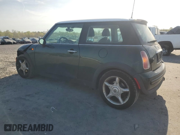 2004 MINI Hardtop with VIN WMWRC334X4TJ61391, listed as a Copart auction lot 53735615 with 103,974 mi miles and Salvage Title. Bid and sale history available at DreamBid. Image 2.