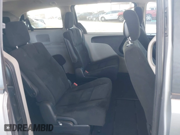 2016 Dodge Grand Caravan SXT with VIN 2C4RDGCG9GR323668, listed as a IAAI auction lot 42025601 with 125,351 mi miles and . Bid and sale history available at DreamBid. Image 8.