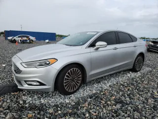 2018 Ford Fusion Titanium с VIN 3FA6P0D91JR207051, выставлен на аукционе Copart как лот 59539135 с пробегом 204 017 миль миль и Списание • Salvage title. История ставок и продаж доступна на DreamBid. Изображение 1.