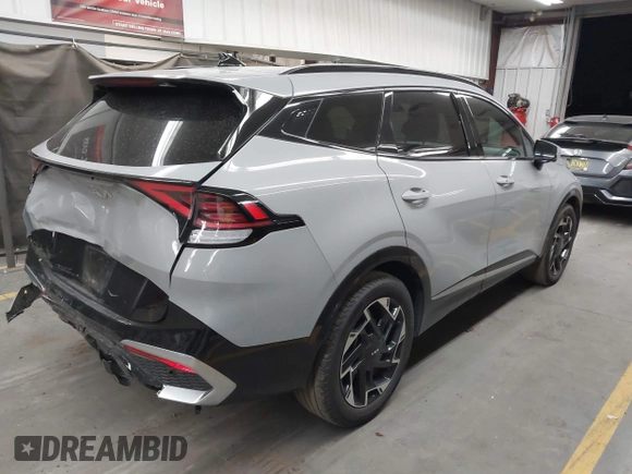 2023 Kia Sportage SX-Prestige with VIN 5XYK53AF2PG035318, listed as a IAAI auction lot 42255966 with 46,330 mi miles and . Bid and sale history available at DreamBid. Image 4.