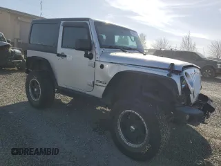 2012 Jeep Wrangler Sport z VIN 1C4AJWAG3CL151885, wystawiony jako Copart lot #51682175 z przebiegiem 111 544 mil mil oraz Szkoda całkowita • Salvage title. Historia ofert i sprzedaży dostępna na DreamBid. Obrazek 4.