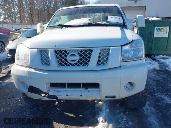 2012 Nissan Titan SV with VIN 1N6BA0EJ0CN309933, listed as a IAAI auction lot 41472091 with 147,635 mi miles. Bid and sale history available at carsss.com. Image 6.