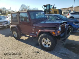 2001 Jeep Wrangler Sahara with VIN 1J4FA59S41P337699, listed as a Copart auction lot 80493224 with 143,036 mi miles and Salvage Title. Bid and sale history available at carsss.com. Image 4.