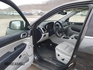 2020 Jeep Grand Cherokee Summit with VIN 1C4RJFJT2LC408499, listed as a IAAI auction lot 41854021 with 78,189 mi miles and . Bid and sale history available at DreamBid. Image 5.