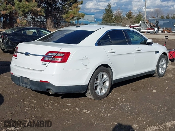 2014 Ford Taurus SEL with VIN 1FAHP2E88EG127074, listed as a IAAI auction lot 41688975 with 186,650 mi miles. Bid and sale history available at carsss.com. Image 4.