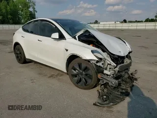 2024 Tesla Model Y Long Range with VIN 7SAYGAEEXRF109995, listed as a Copart auction lot 55160345 with Not provided miles and Salvage title. Bid and sale history available at DreamBid. Image 14.