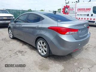 2012 Hyundai Elantra Limited with VIN KMHDH4AE5CU369859, listed as a IAAI auction lot 42095240 with 174,486 mi miles. Bid and sale history available at carsss.com. Image 3.