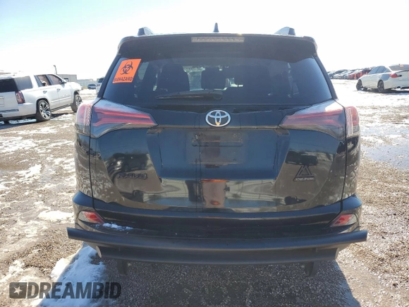 2018 Toyota RAV4 XLE with VIN 2T3RFREV2JW804022, listed as a Copart auction lot 87150944 with Not Provided miles and Salvage Title. Bid and sale history available at DreamBid. Image 6.