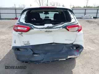2016 Jeep Cherokee Sport with VIN 1C4PJMAB1GW218412, listed as a IAAI auction lot 41909027 with 167,206 mi miles. Bid and sale history available at carsss.com. Image 6.