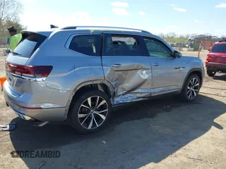 2024 Volkswagen Atlas SEL Premium R-Line z VIN 1V2FR2CA2RC551914, wystawiony jako IAAI lot #42028289 z przebiegiem 16 240 mil mil oraz . Historia ofert i sprzedaży dostępna na DreamBid. Obrazek 4.